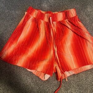 Fashion Nova Women's Orange Striped Shorts set | Top and bottom